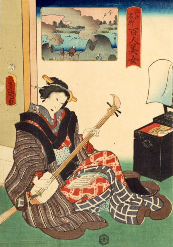 三味線を爪弾く江戸時代の女性（『江戸名所百人美女』「今戸」歌川豊国 画）の拡大画像